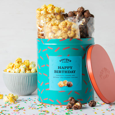 Popcorn Shed's range of gourmet Birthday gifts, including their flagship product; the Happy Birthday popcorn gift tin